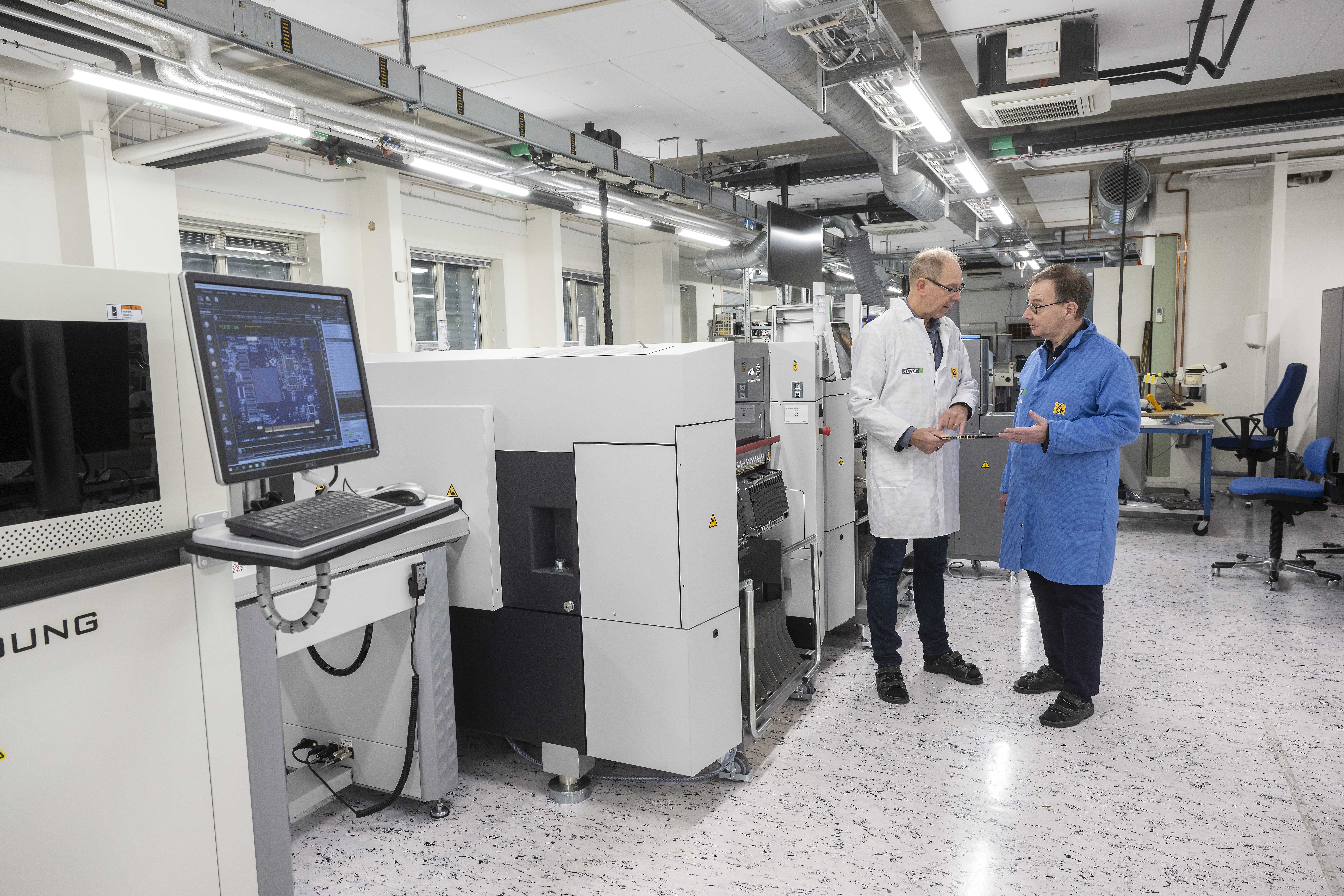 Bild på Christian Sahlén, CEO på Actia och Martin Rantzer, Prefekt / Department Manager på Linköpings universitet.